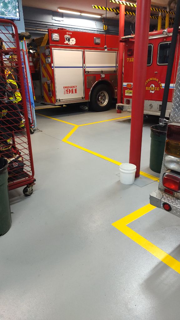Fire station grey epoxy floor with yellow lines, Jefferson Twp, NJ